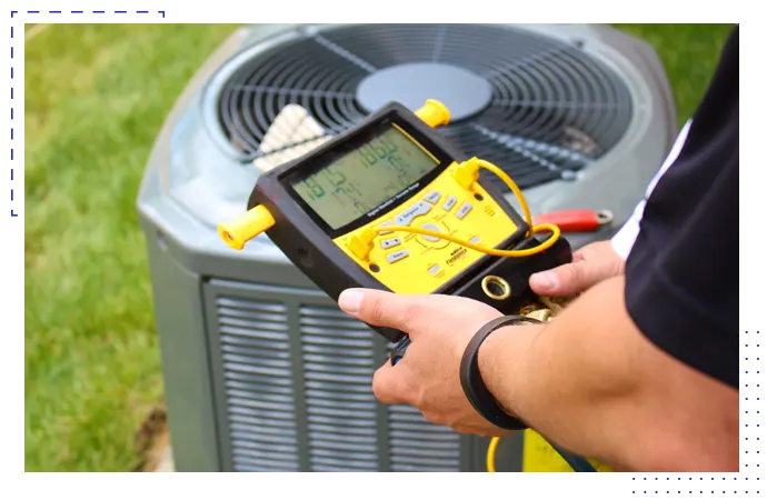 HVAC technician measuring and installing properly sized air conditioning system